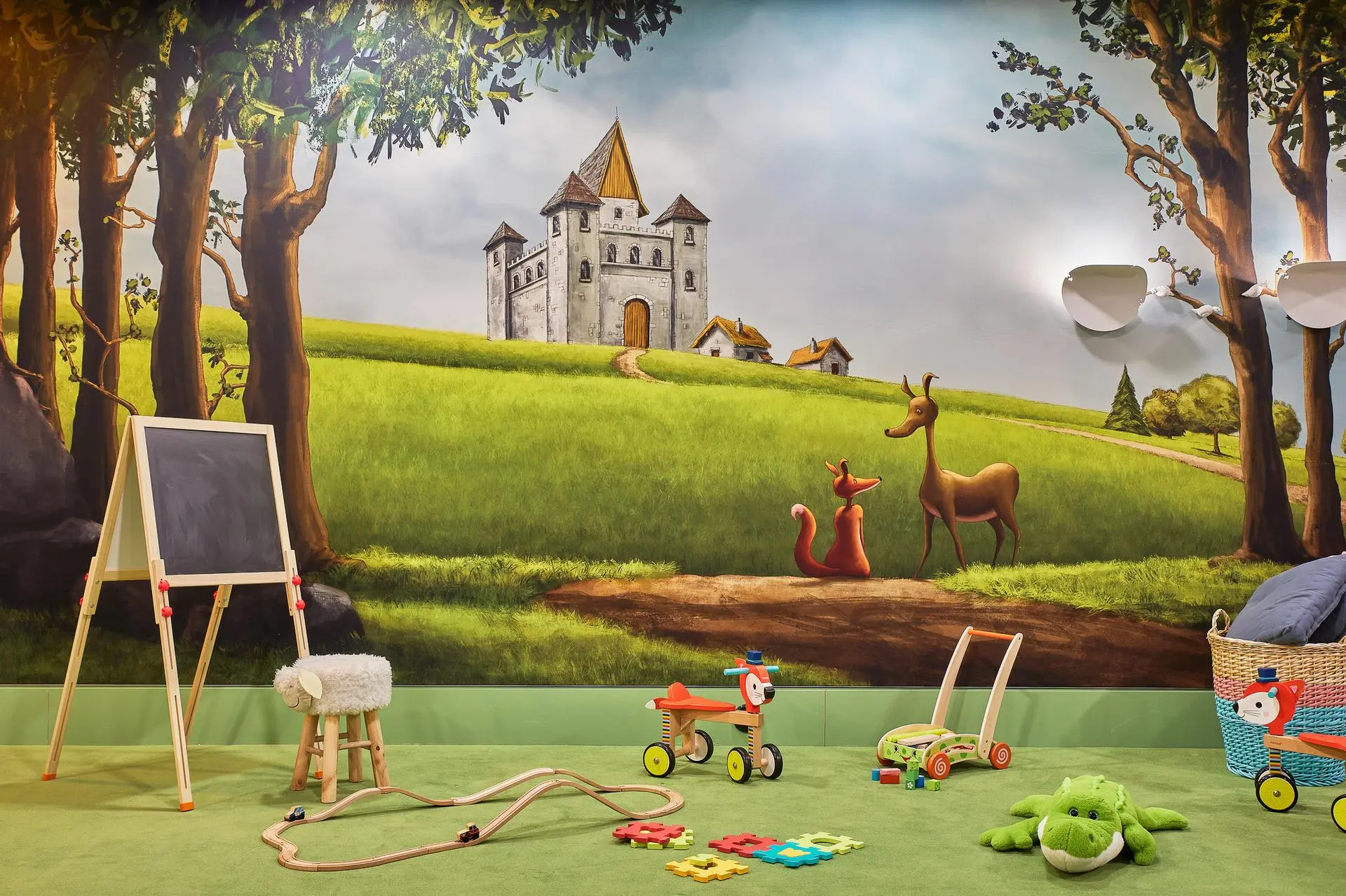 A luxury indoor kids play area representing exclusive holiday childcare and VIP nanny services around the world.