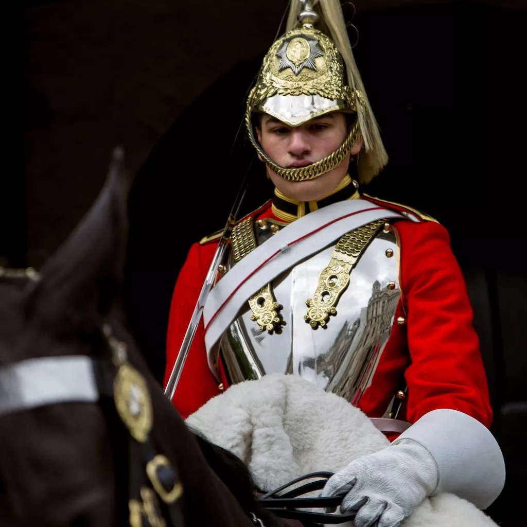 Iconic royal guard on horseback representing bespoke private family tours and exclusive VIP experiences around the world.