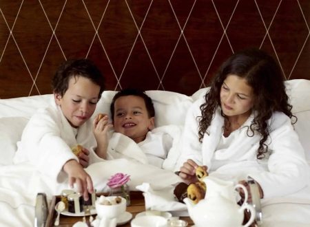 Luxury Family Travel Destinations with VIP Trips for Kids, children having room service for breakfast