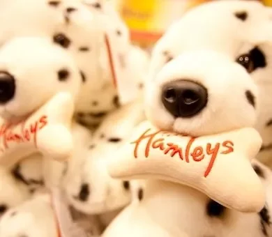 Stuffed Dalmatian plush toy display inside the Hamleys toy store in London.