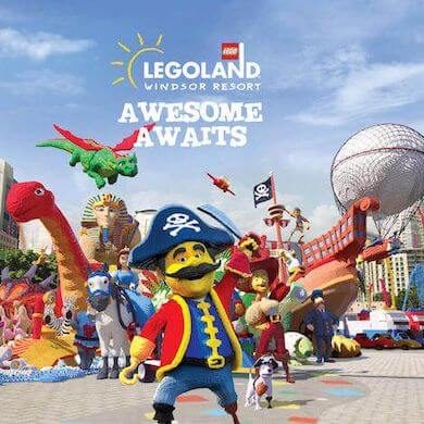 LEGO pirate character standing in front of the iconic theme park entrance at LEGOLAND Windsor Resort.