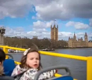 An engaging open-top London bus tour for kids featuring private family seating and captivating sightseeing storytelling.
